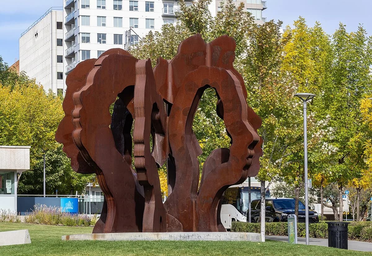 The Garden, a steel sculpture by Richard Tosczak and Jacob Dutton, beside autumn trees at Edmonton’s Legislature Grounds.